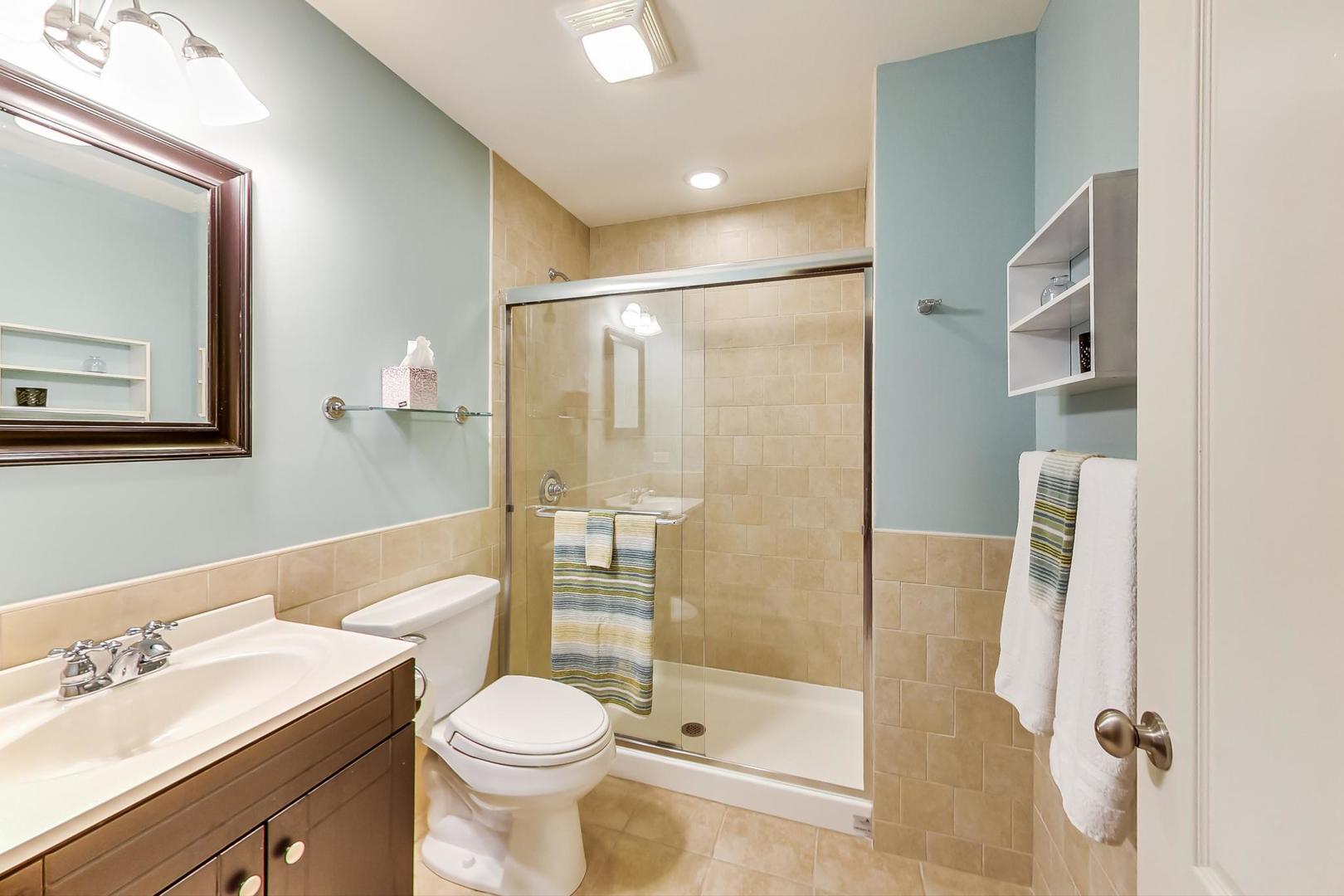 335 Ridge Road Kenilworth, IL 60043 - Photo 20 of 26 a bathroom with a sink toilet and shower