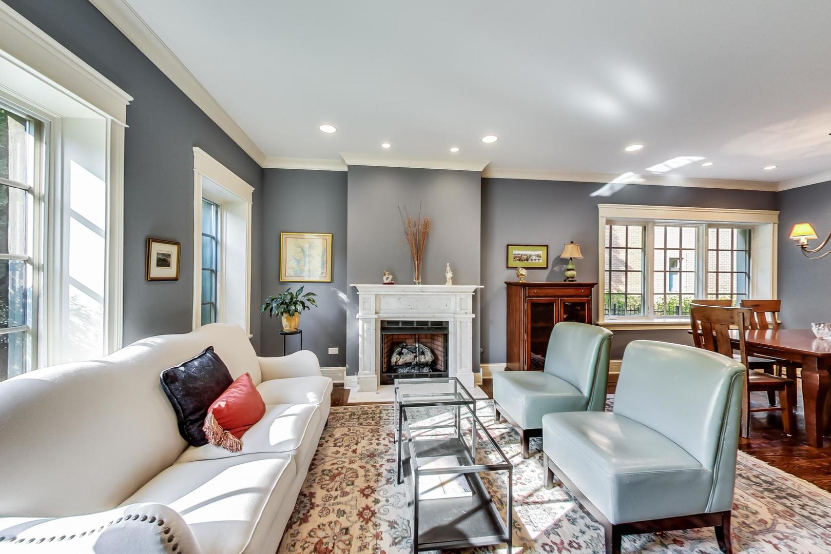 335 Ridge Road Kenilworth, IL 60043 - Photo 2 of 26 a living room with furniture fireplace and window