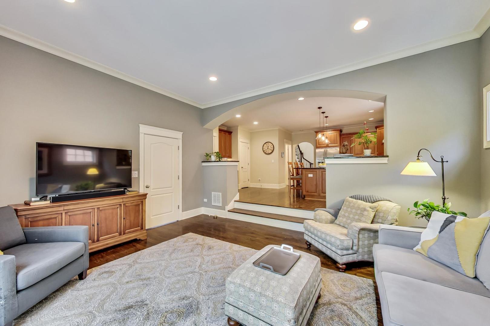 335 Ridge Road Kenilworth, IL 60043 - Photo 7 of 26 a living room with furniture and a flat screen tv