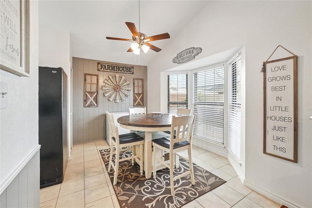 4522 Ebb Tide Drive Rowlett, TX 75088 - Photo 8 of 26 a view of a dining room with furniture and window