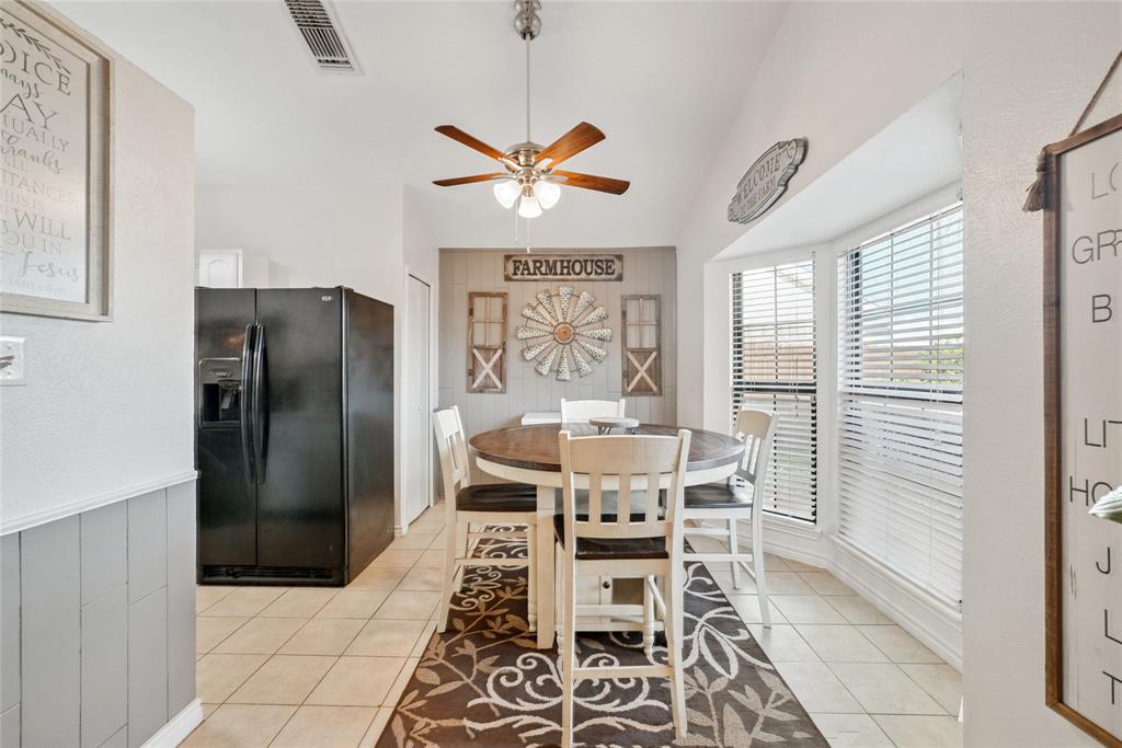 4522 Ebb Tide Drive Rowlett, TX 75088 - Photo 9 of 26 a dining room with furniture and window