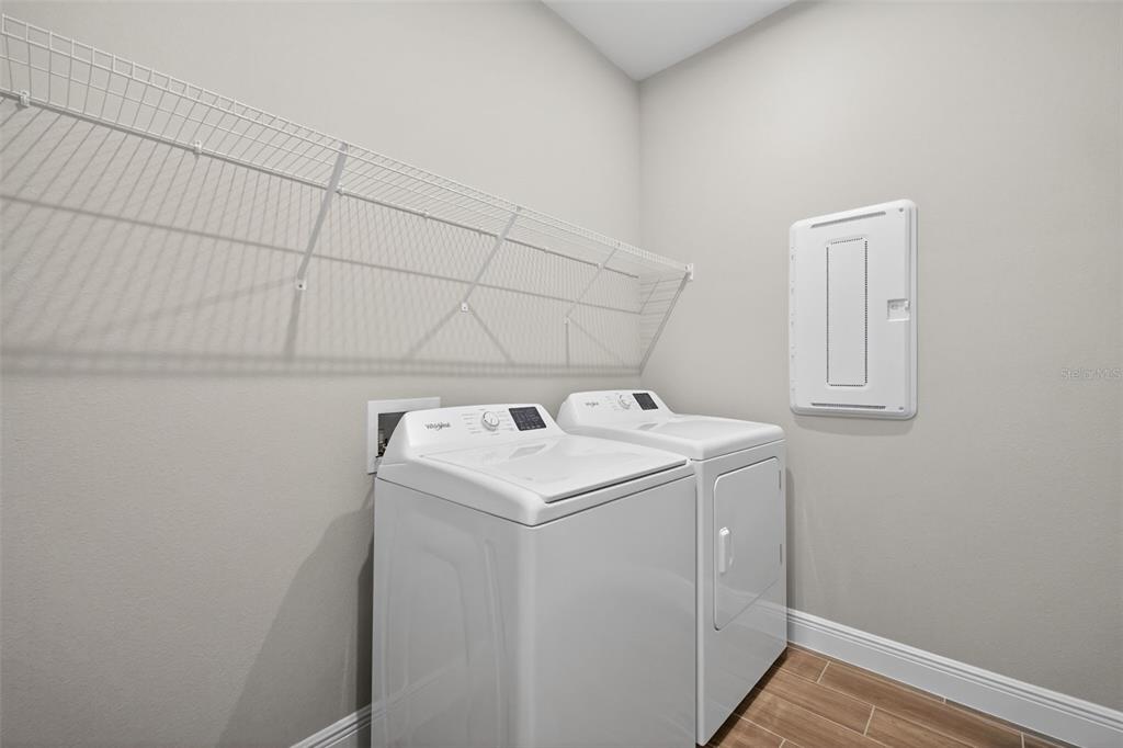 12349 49th Street East Parrish, FL 34219 - Photo 22 of 38 a utility room with dryer and washer