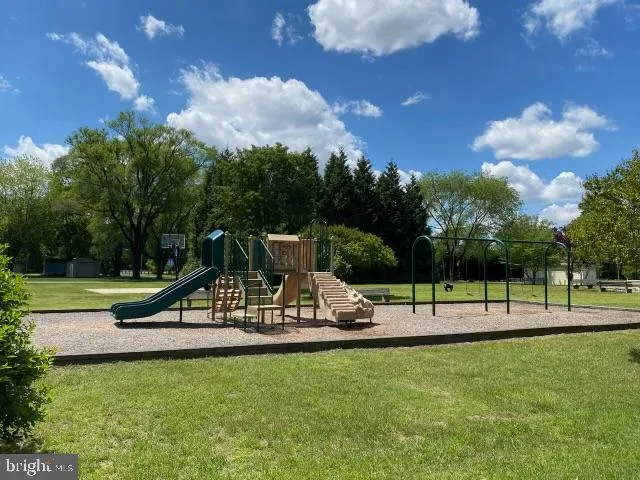 a view of a park with swings
