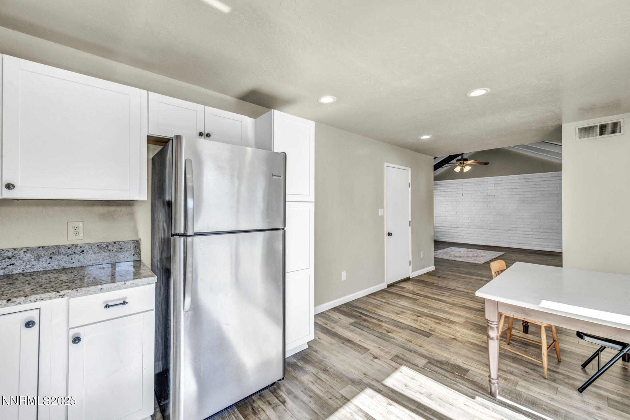 11 Castle Way Carson City, NV 89706 - Photo 13 of 34 a kitchen with stainless steel appliances granite countertop a refrigerator and a stove