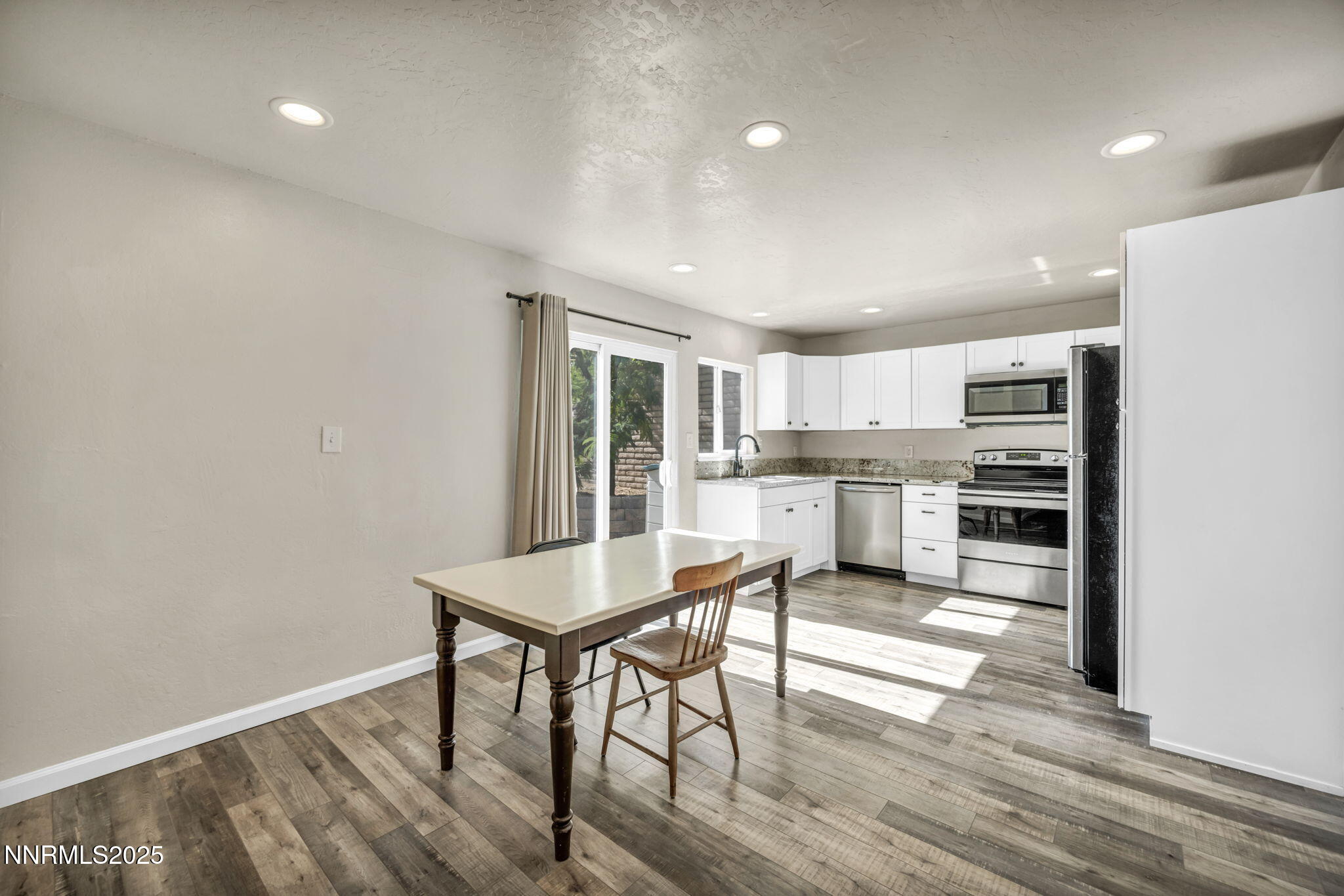11 Castle Way Carson City, NV 89706 - Photo 14 of 34 a kitchen with a table and chairs