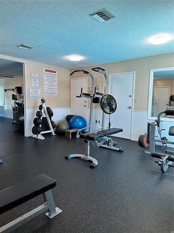 a view of swimming pool with outdoor seating