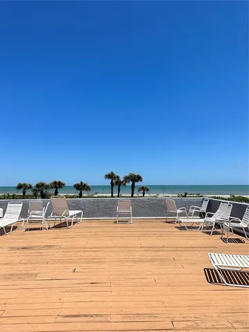 a view of swimming pool with a yard