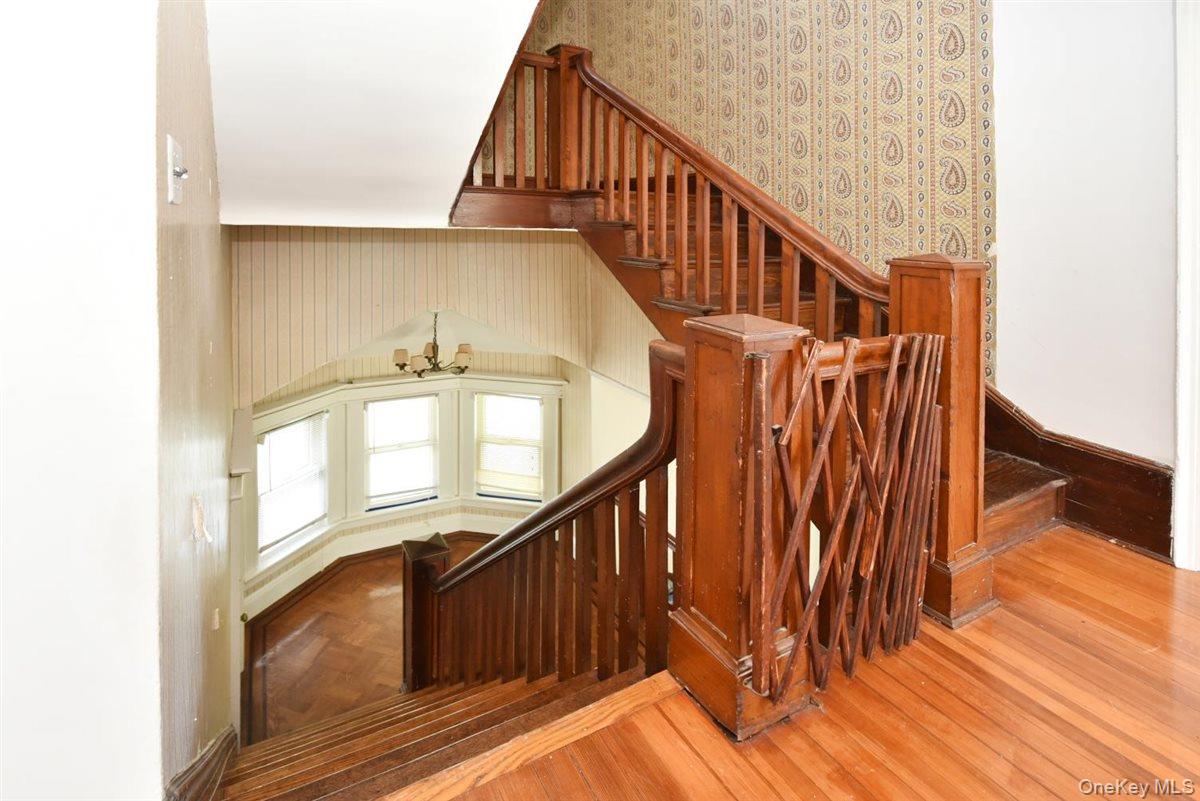 101 Wallace Street Freeport, NY 11520 - Photo 26 of 37 a view of entryway with wooden floor
