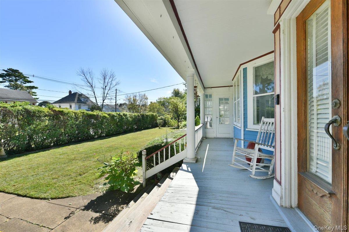 101 Wallace Street Freeport, NY 11520 - Photo 3 of 37 a view of a balcony with outdoor space