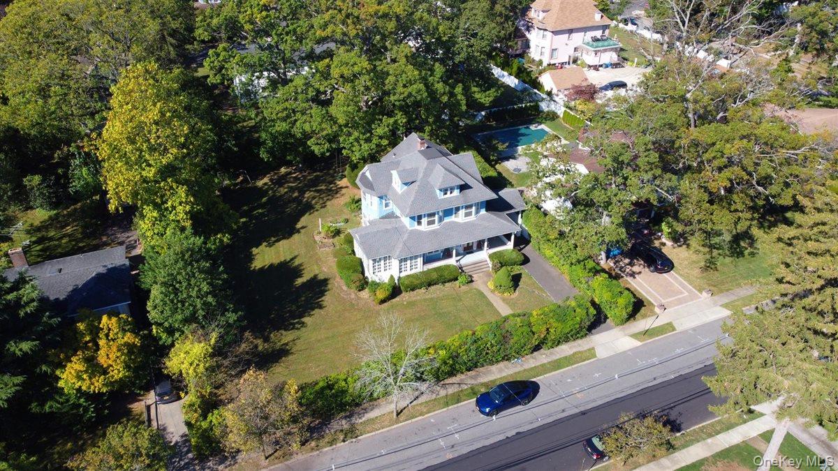 101 Wallace Street Freeport, NY 11520 - Photo 33 of 37 an aerial view of a house with a yard outdoor seating