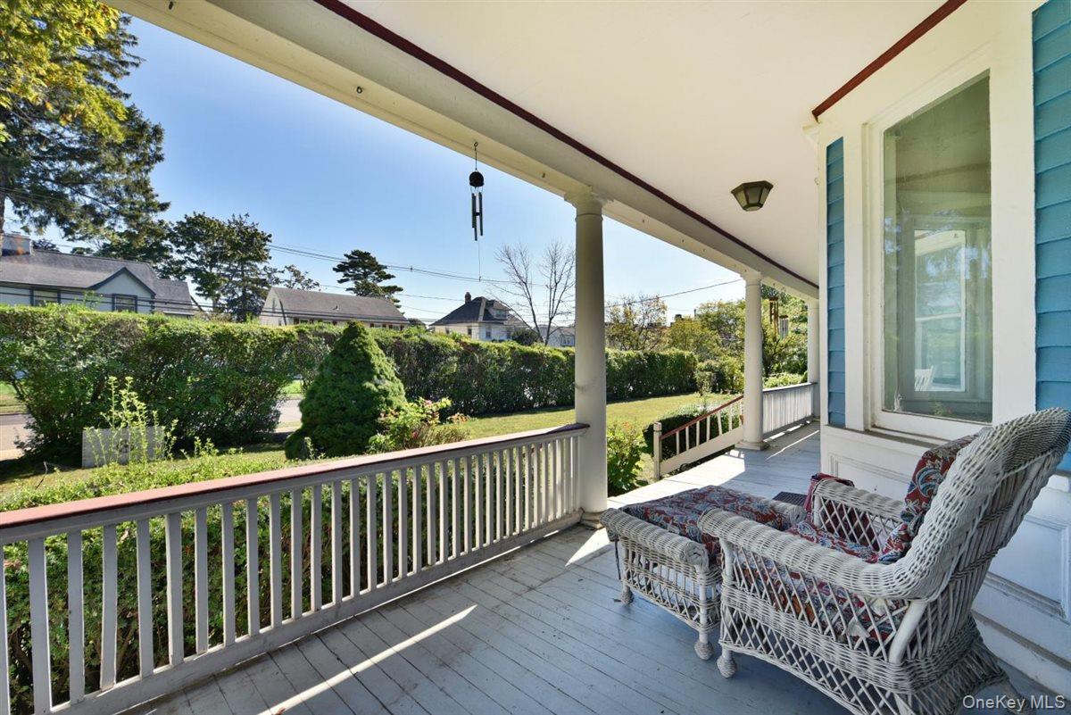 101 Wallace Street Freeport, NY 11520 - Photo 4 of 37 a view of a two chair in the balcony
