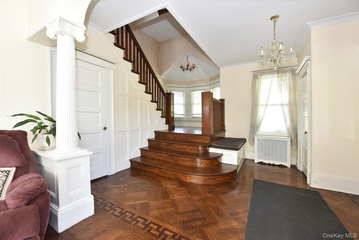 101 Wallace Street Freeport, NY 11520 - Photo 5 of 37 a view of an entryway with wooden floor