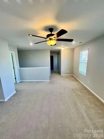 a view of an empty room with window