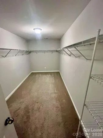 a view of a room with racks on the wall