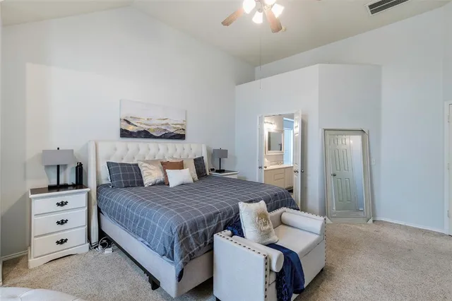 a large kitchen with kitchen island a sink stainless steel appliances and cabinets