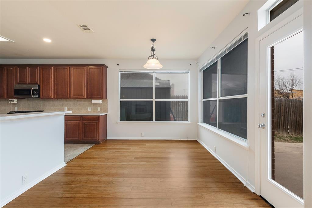 3010 St Joseph Drive Mansfield, TX 76063 - Photo 26 of 33 a view of a kitchen with a sink and a window