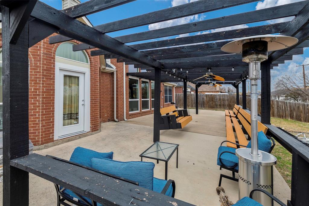 3010 St Joseph Drive Mansfield, TX 76063 - Photo 27 of 33 a view of a porch with furniture