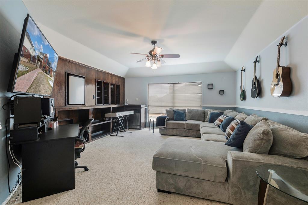 3010 St Joseph Drive Mansfield, TX 76063 - Photo 5 of 33 a living room with furniture and a flat screen tv