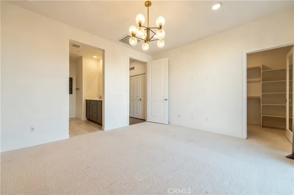 a bathroom with a double vanity sink and mirror