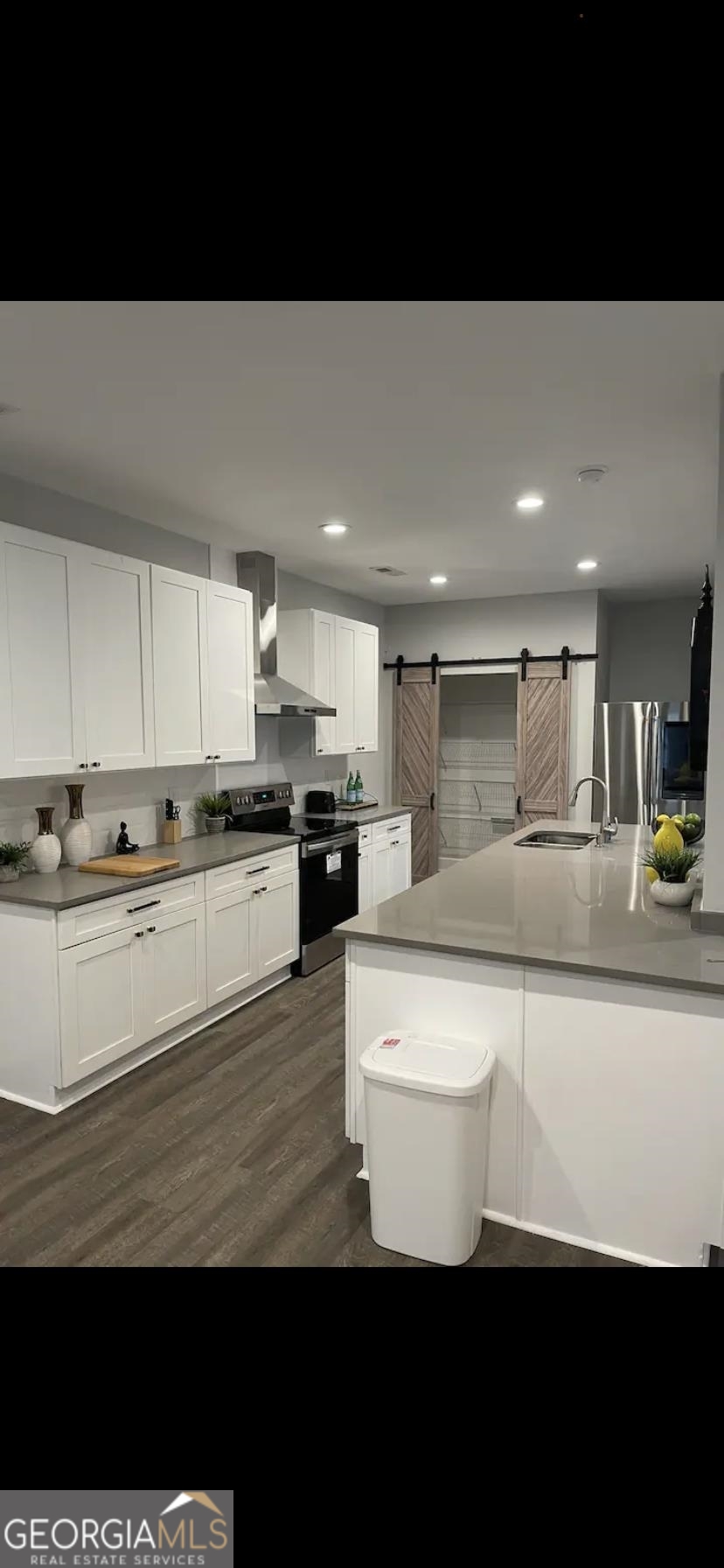 966 McDaniel Street Southwest Atlanta, GA 30310 - Photo 4 of 10 a view of kitchen with wooden floor