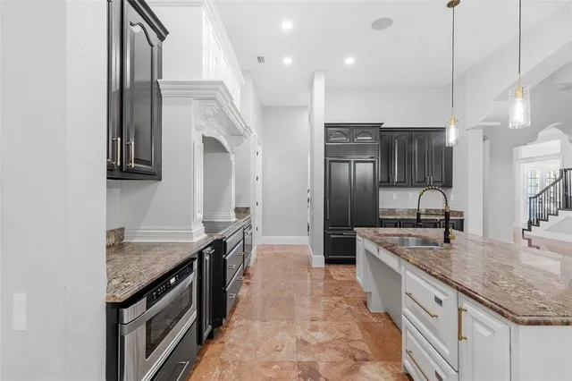 a view of room with window and chandelier fan