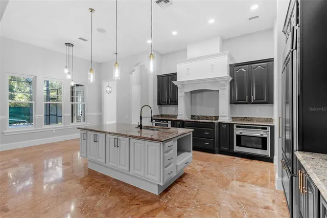 a view of a hallway view with wooden floor and staircase