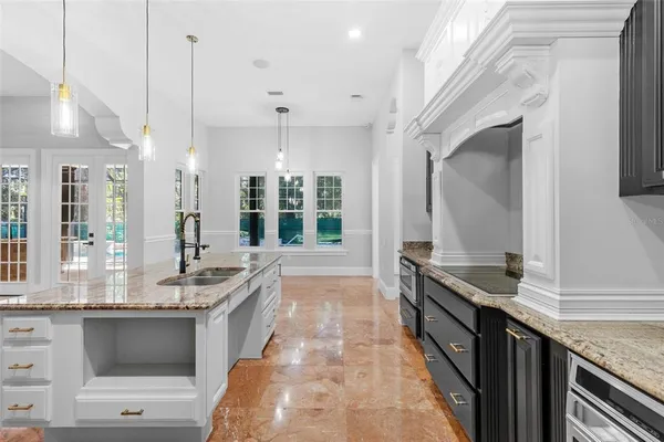 a bathroom with a shower and a sink