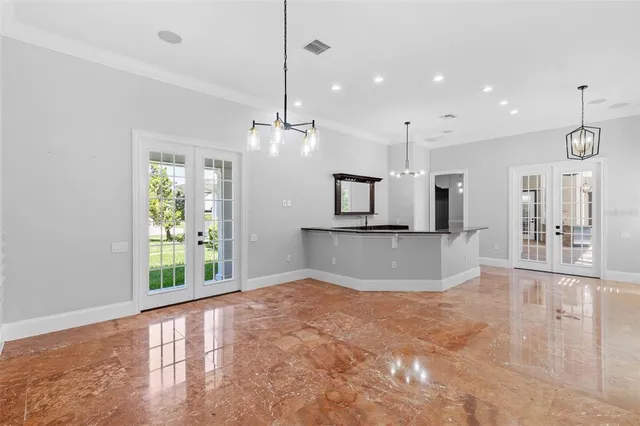 a view of an empty room and window