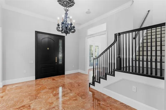 a front view of a house with a porch