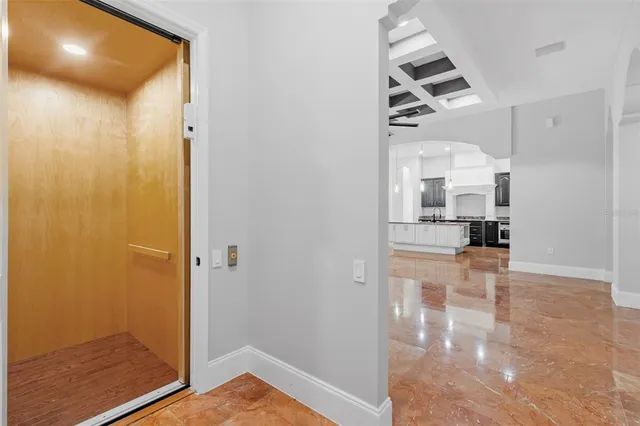 a bathroom with a shower sink and mirror