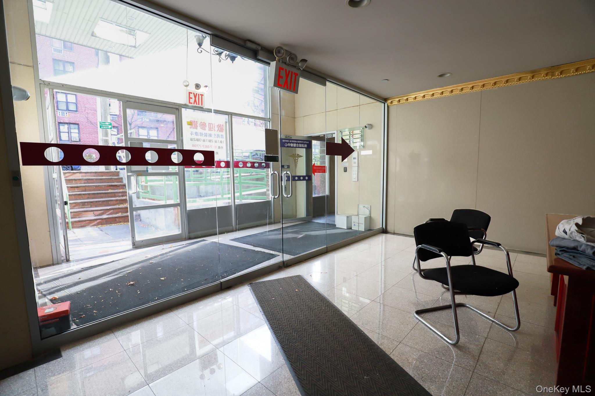 134-43 Maple Avenue, Unit 5B Queens, NY 11355 - Photo 2 of 13 a living room with furniture