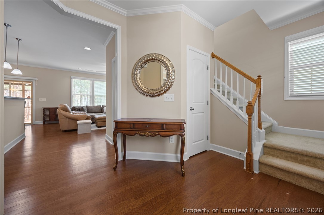 126 Pine Hawk Drive Spring Lake, NC 28390 - Photo 7 of 48 a living room with furniture a rug and a window