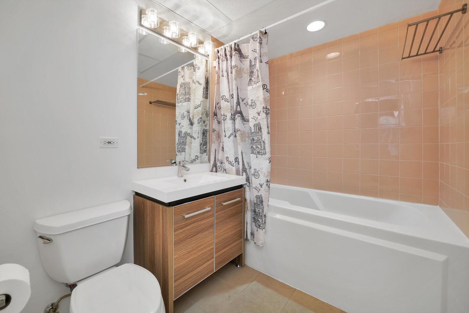 6 East Monroe Street, Unit 1501 Chicago, IL 60603 - Photo 12 of 27 a bathroom with a granite countertop sink toilet and shower