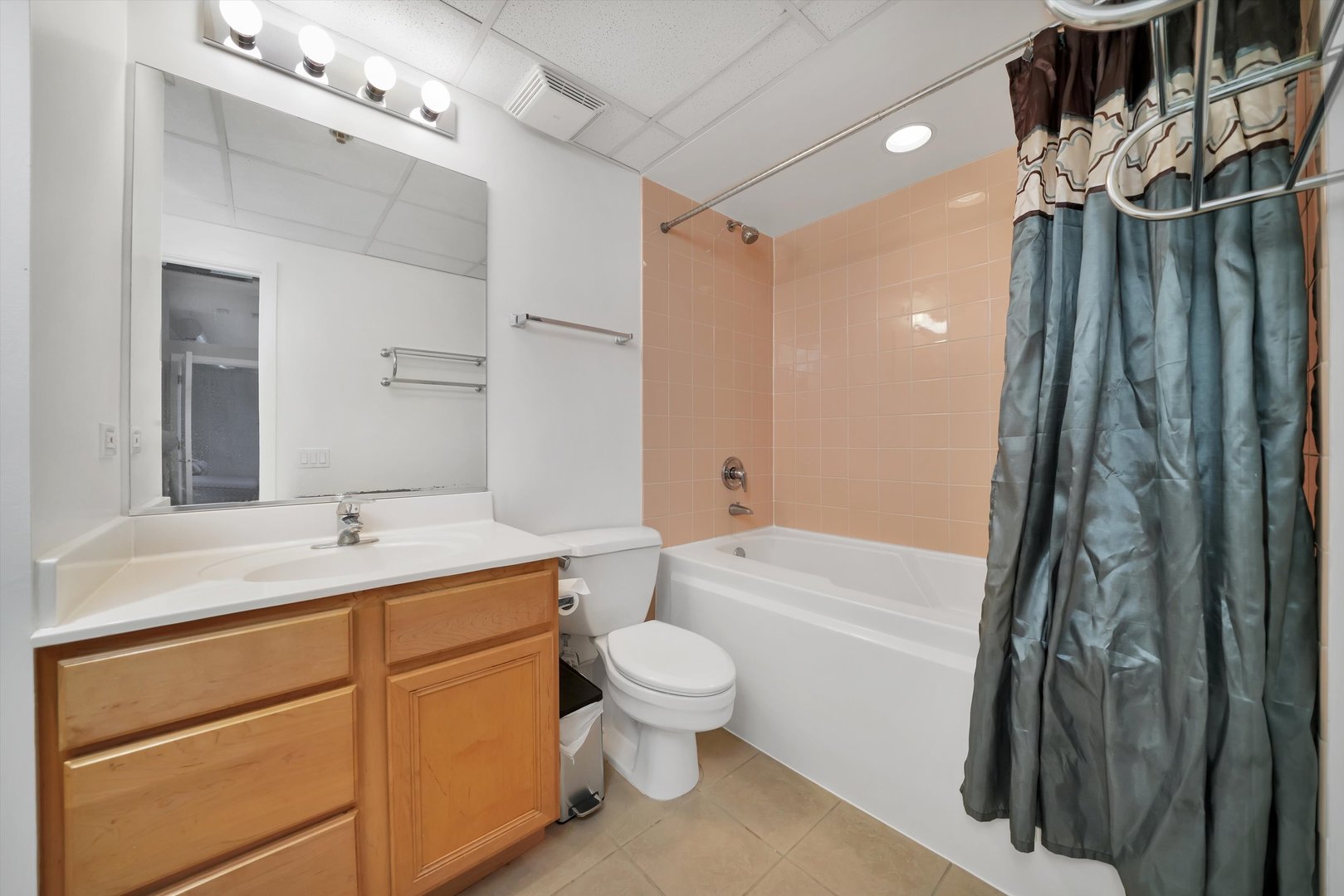 6 East Monroe Street, Unit 1501 Chicago, IL 60603 - Photo 14 of 27 a bathroom with a sink a toilet and shower