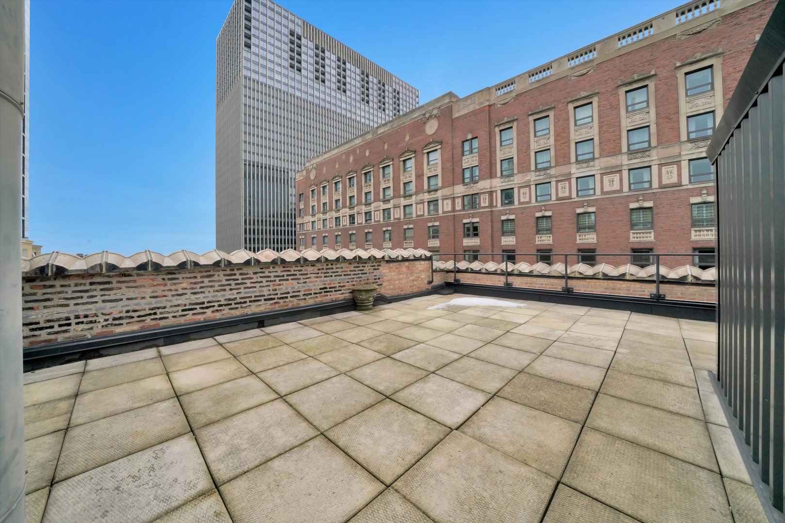 6 East Monroe Street, Unit 1501 Chicago, IL 60603 - Photo 20 of 27 a view of a building from a roof