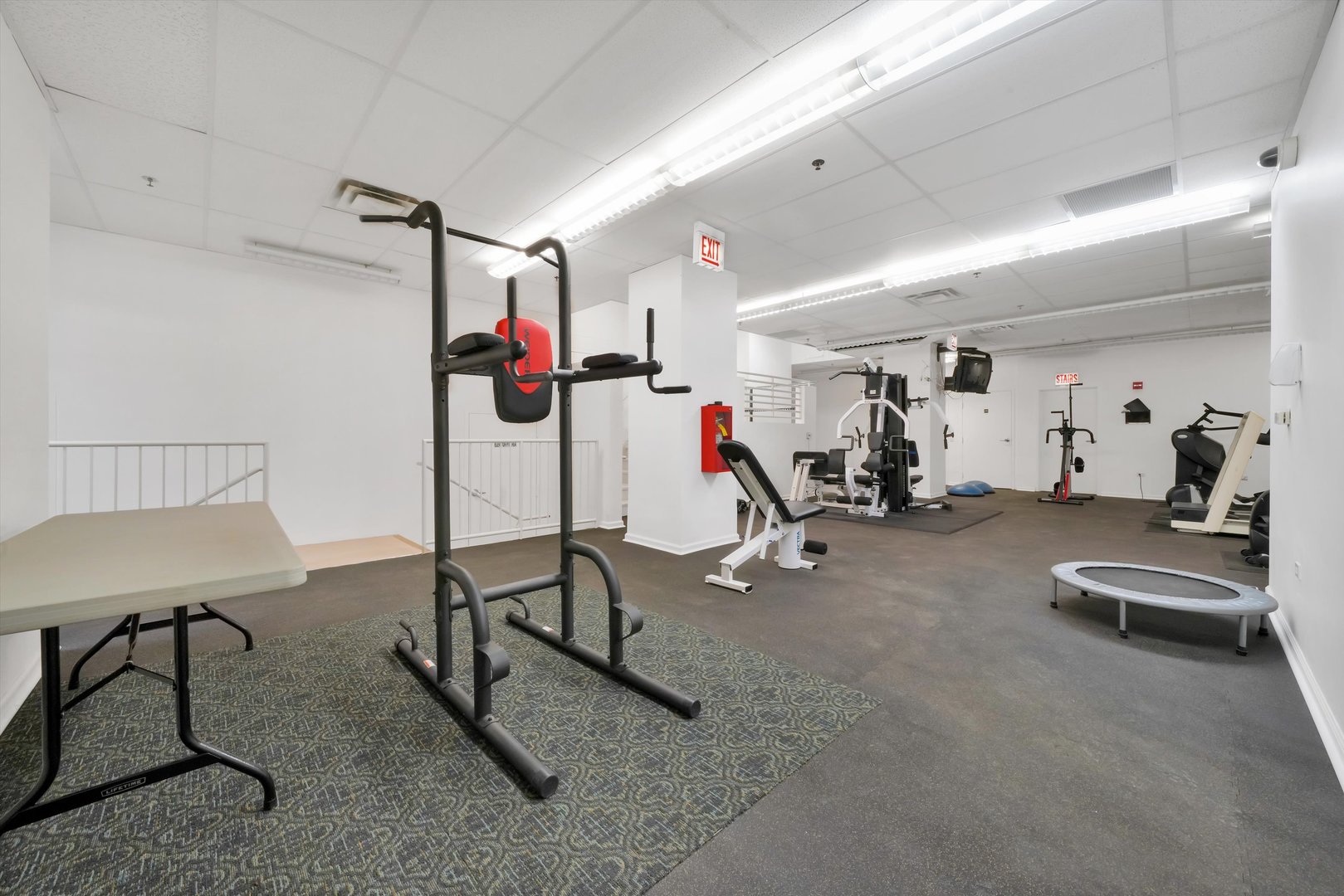 6 East Monroe Street, Unit 1501 Chicago, IL 60603 - Photo 23 of 27 a view of a room with gym equipment
