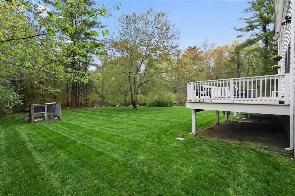59 First Parish Road Norwell, MA 02061 - Photo 31 of 37 a view of a chair and table in the garden