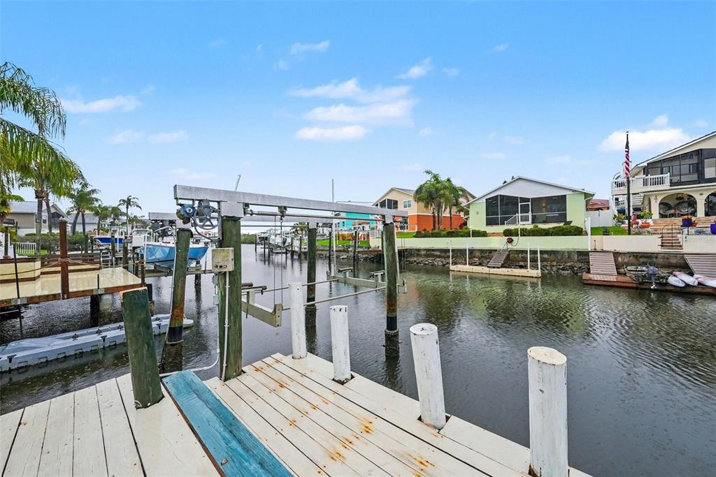 6225 Bayside Drive New Port Richey, FL 34652 - Photo 23 of 31 a balcony with outdoor seating and lake view