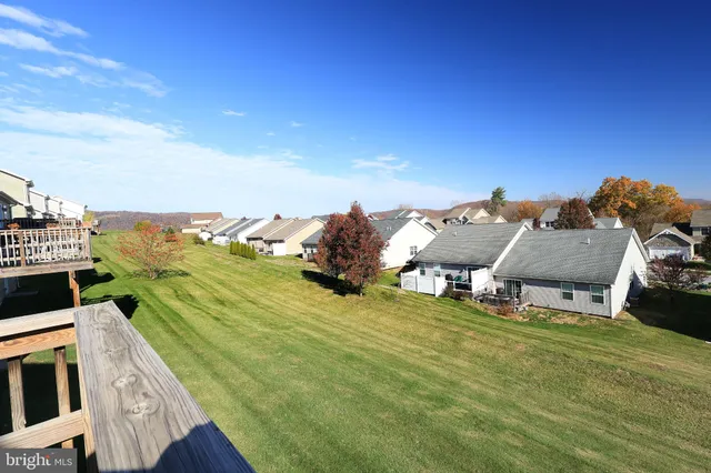 a view of a terrace with chairs