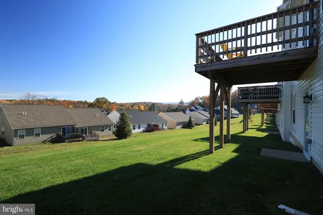 a view of a porch with a yard