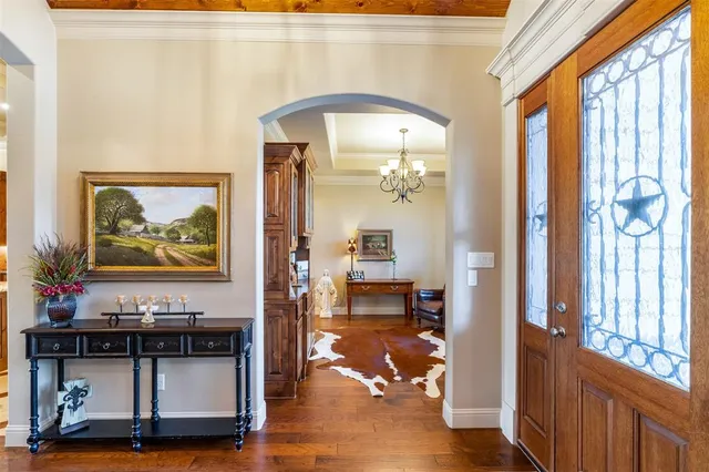 a view of living room filled with furniture and window
