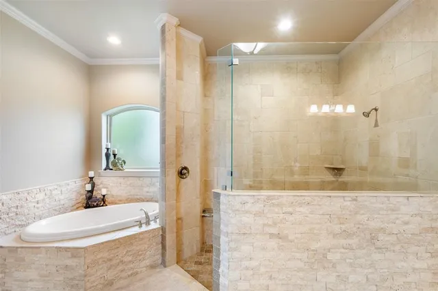 a bathroom with a double vanity sink toilet and shower