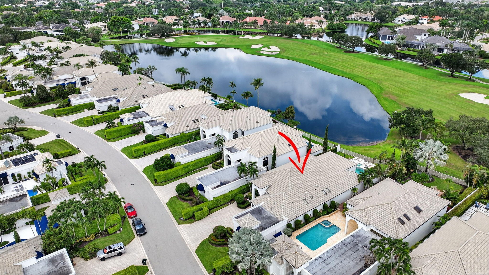 2563 Northwest 63rd Street Boca Raton, FL 33496 - Photo 60 of 65 an aerial view of a house with a garden