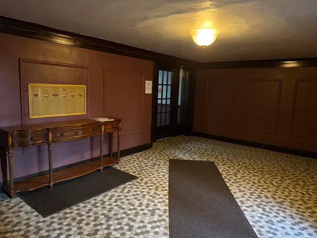 a view of a livingroom with furniture