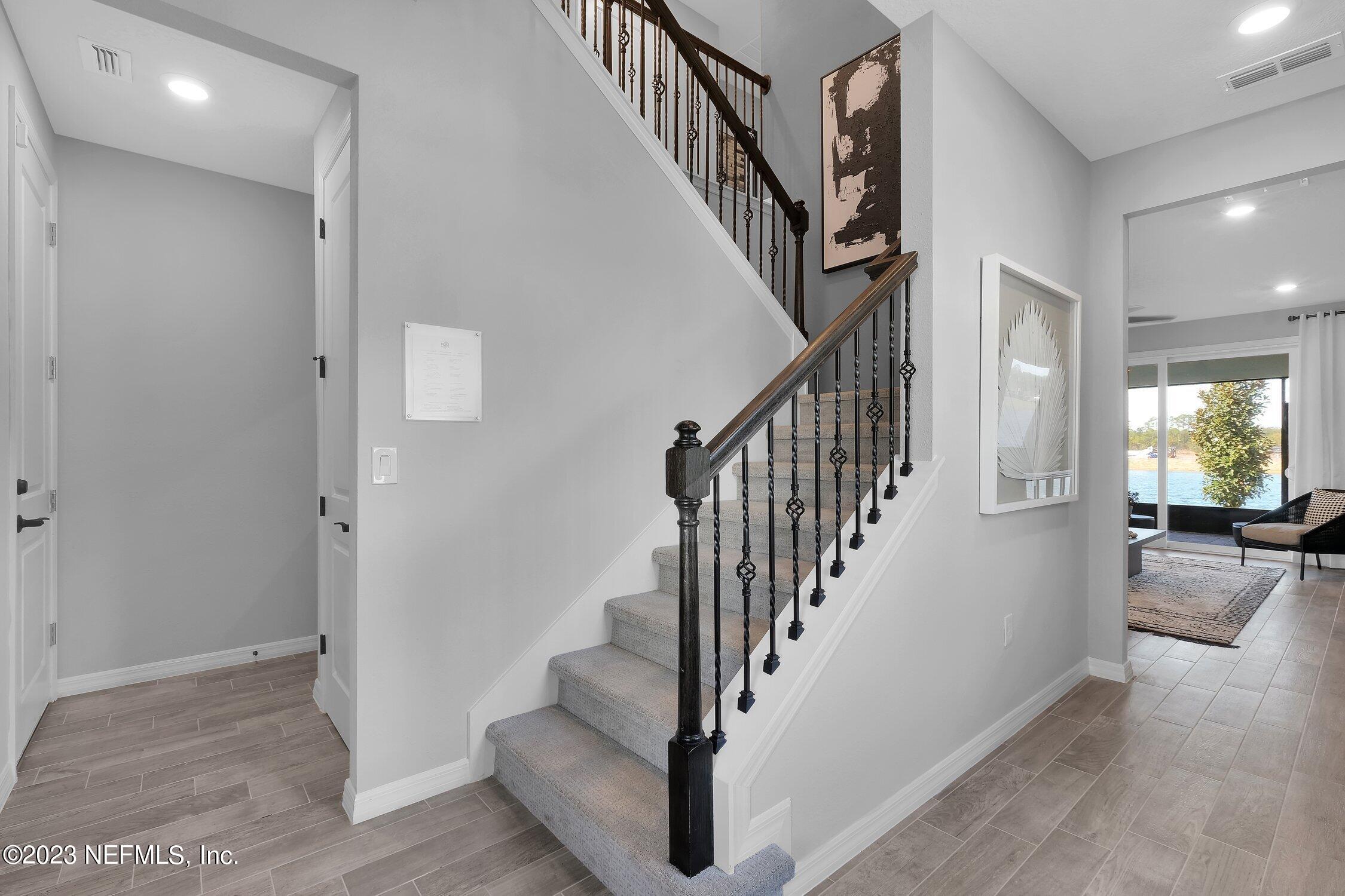 731 Blind Oak Circle St. Augustine, FL 32095 - Photo 13 of 34 a view of entryway and hall with wooden floor