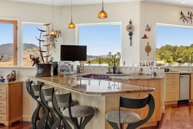 a living room with a fireplace and a flat screen tv