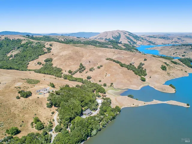 an aerial view of a house with a garden
