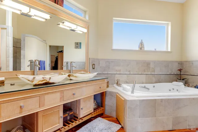 a front view of a house with a yard patio and furniture