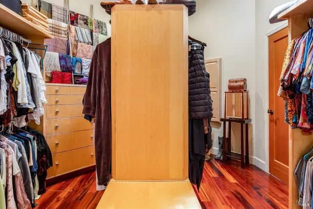 a kitchen with a sink counter top space and stainless steel appliances