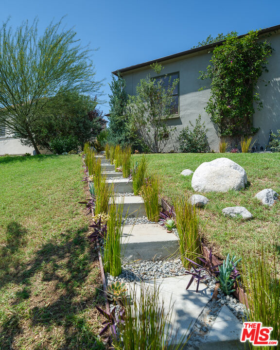 1422 Maple Street South Pasadena, CA 91030 - Photo 3 of 45 a view of a garden with plants and large trees